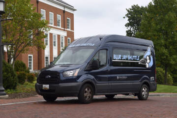 Blue Jay shuttle in front of Mason Hall